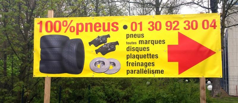 Bâches publicitaires pour 100% Pneus MultiGome à Mantes.